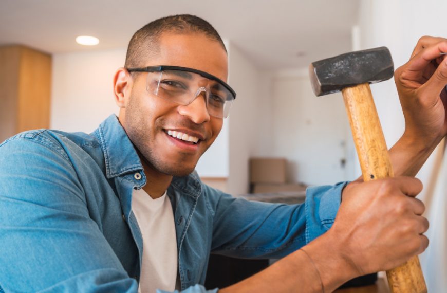 a man with hammer home improvement
